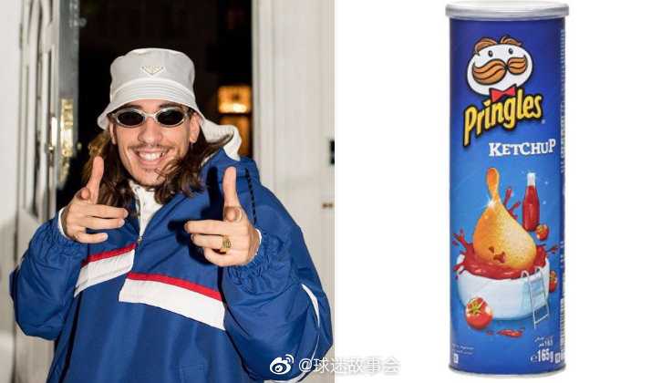 贝莱林身穿那件引发热议的彩色条纹衫在场边热身，衣服的几何图案在阳光下格外醒目
